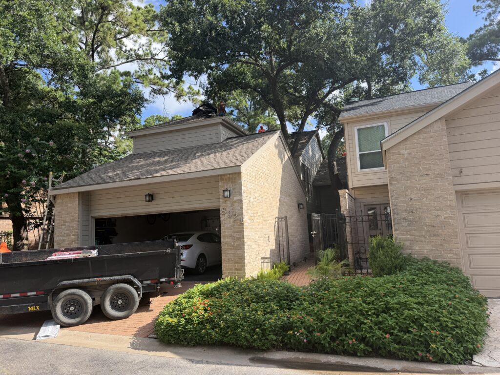 Roof repair crew on Sienna Missouri City home