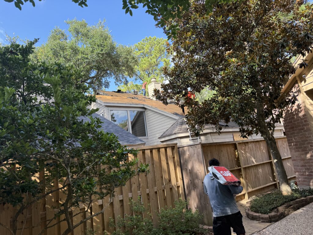 Roofers repairing roof in Sienna Missouri City