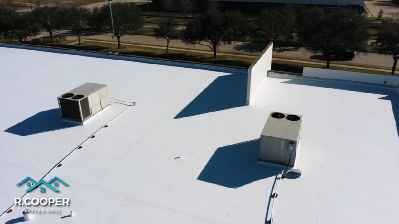 Finished white TPO roof installed by R. Cooper Roofing in Fort Bend County TX